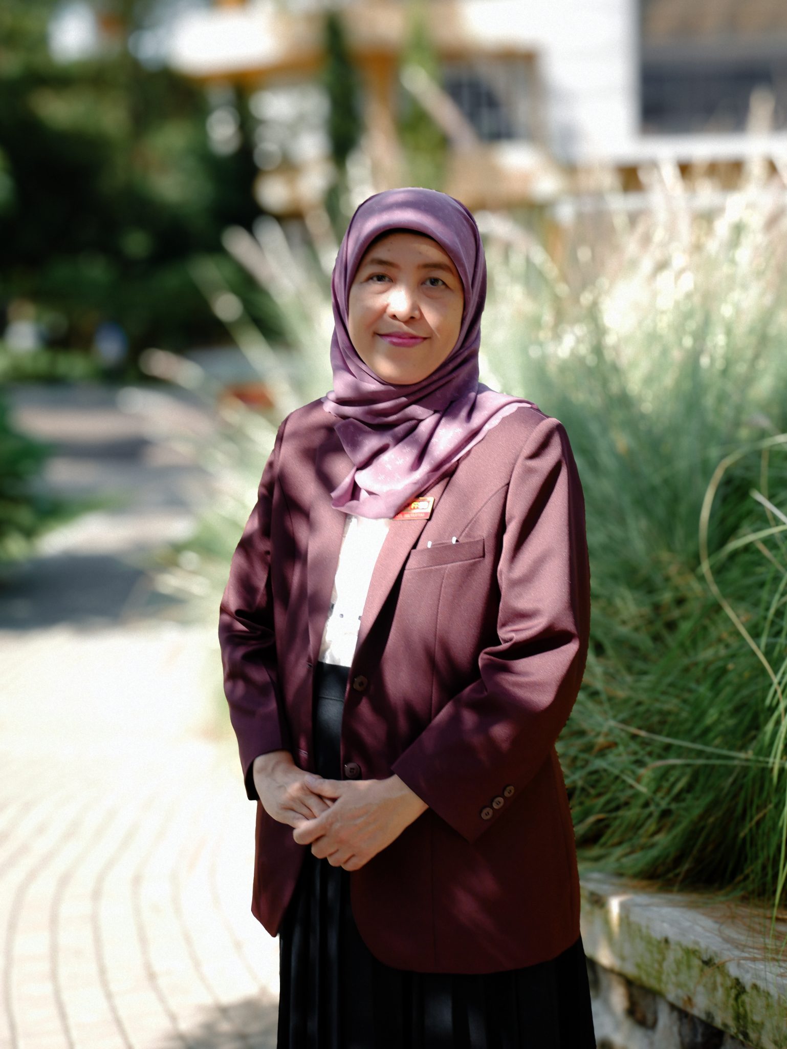 Dr. Rita Milyartini, M.Si.