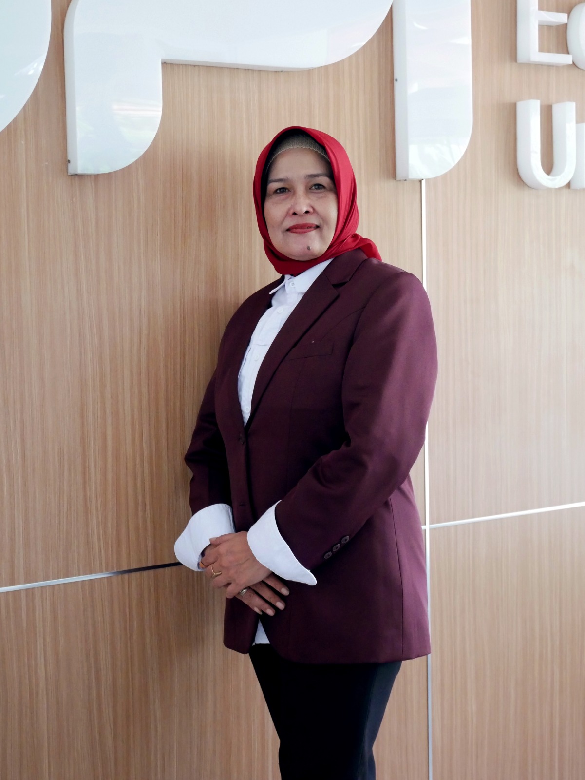 Dr. Reni Haerani, M.Pd